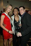 Miss Universe 2004 Jennifer Hawkins, Esther Swan, and Rick Leipzig   at the People Reaching Out Holiday Charity Event at the private residence of David Larkin on 12-13-04 in Manhattan, N.Y. photo by Rob Rich copyright 2004<br>516-676-3939<br>robwayne1@aol.com
